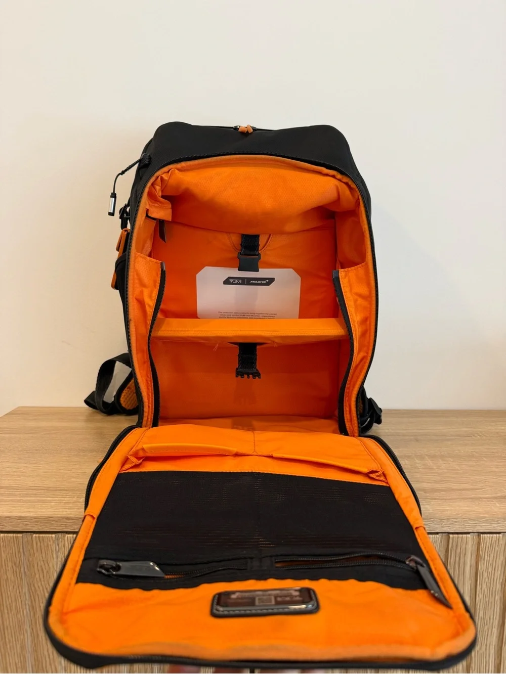 Tumi Black and Orange Men's Backpack with Detachable Travel Pouch